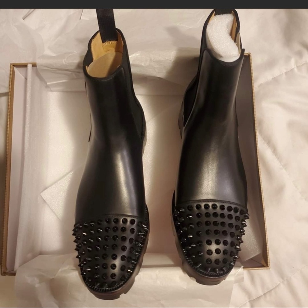 Authentic Christian Louboutin boots , fit 9 to 9 1/2 very nice boots.